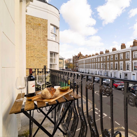 Sip wine on the balcony above the London streets