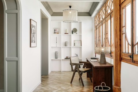 Work or unwind in a bright room with original wooden windows