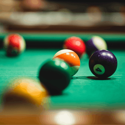 Challenge your party to a game of billiards