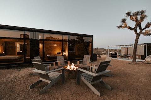 Gather around the fire pit as the sun starts to set