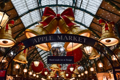 Savour Covent Garden's street performers, boutiques, and market halls, a one-minute stroll