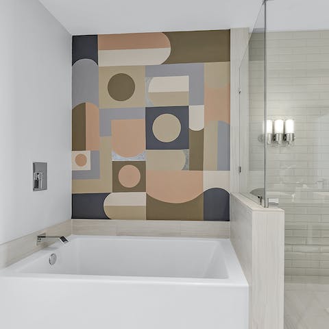 Freshen up in the huge shower or the luxurious soaking tub