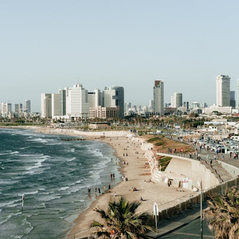 Spend relaxing days down on Geula Beach, just footsteps away