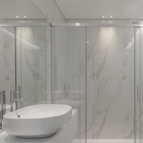 Kickstart your day beneath the luxurious rainfall shower