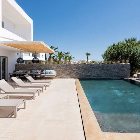 Spend relaxing days by the swimming pool