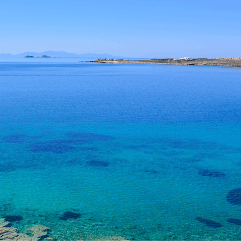 Discover the idyllic coastline of Paros from the heart of Dryos