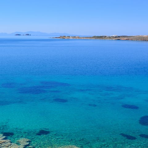 Discover the idyllic coastline of Paros from the heart of Dryos