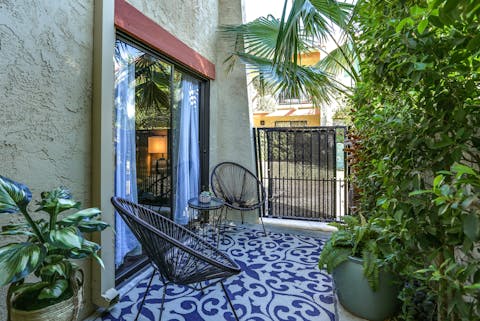 Sit outside on the patio with a cool drink and a good book