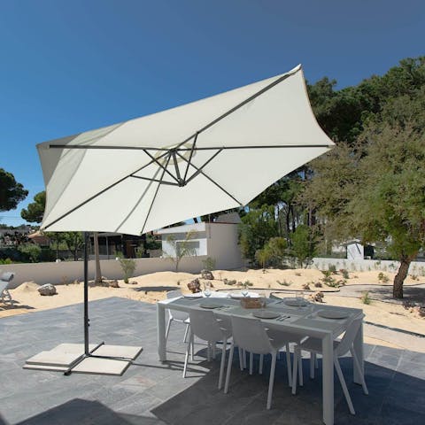 Enjoy a barbecue under the shade on the patio