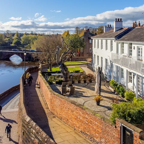 Gaze out over the River Dee from the dining table on the large terrace