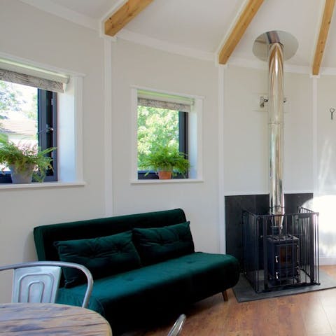 Get cosy in front of the wood-burning stove on winter evenings