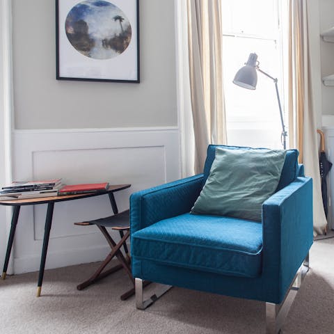 Relax with a book by the original fireplace
