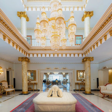 Soak in the glamour of the main living area, complete with a huge chandelier