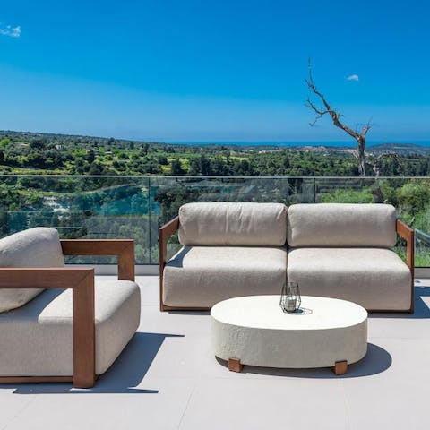 Sip cocktails on the terrace – it's the best spot for sunset