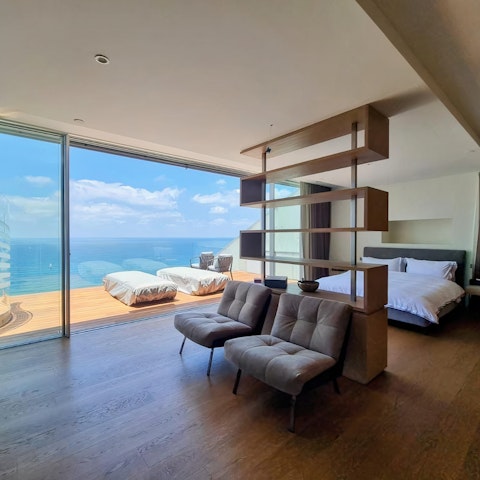 Roll out of bed and onto the balcony to watch the sunrise
