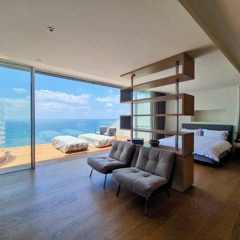 Roll out of bed and onto the balcony to watch the sunrise