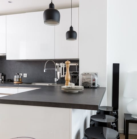 Perch at the breakfast bar as a French omelette sizzles on the stove