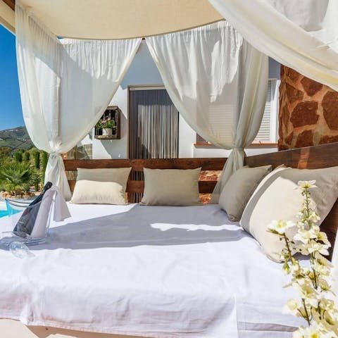 Bring out a book and read undisturbed on the Balinese bed