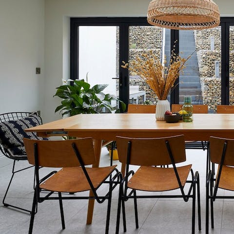 Gather in the light-filled dining area