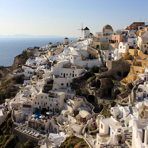 Stay amid Oia, home to the Blue Domed Church and a 15th-century castle