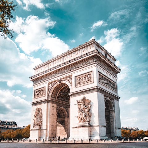 Walk twelve minutes to the iconic Arc de Triomphe
