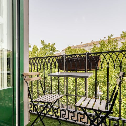 End the day with a glass of Spanish wine on the balcony