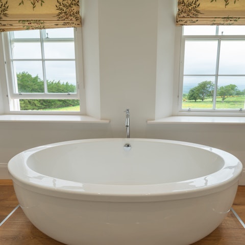 Unwind in an enormous oval bathtub