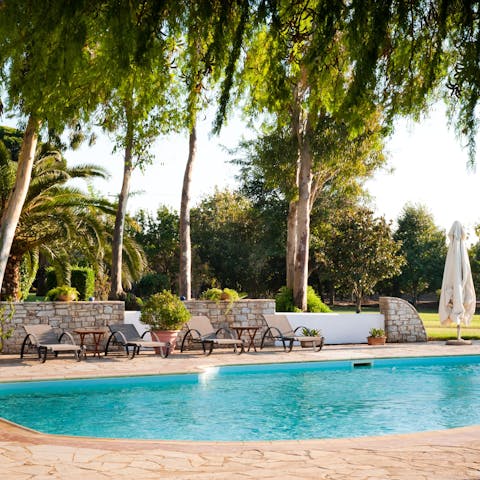 Slip into the stone-lined swimming pool to cool off