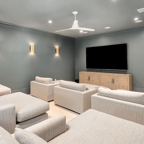 Take a break from the sun and watch a movie in the home cinema room