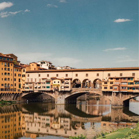 Visit the nearby Ponte Vecchio on the River Arno