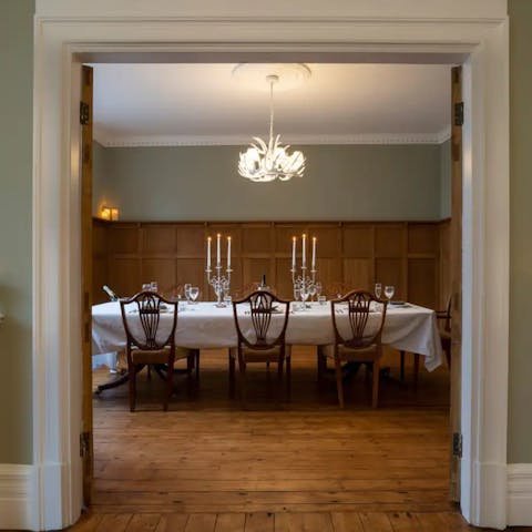 Sit down to a formal meal in the elegant dining room