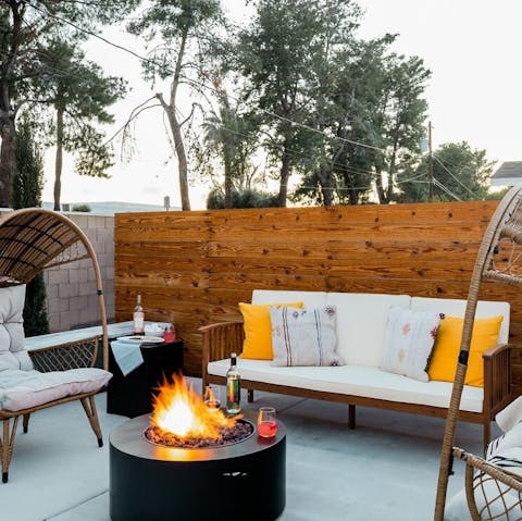 Sip on sundowners by the fire pit