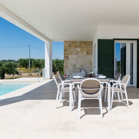 Enjoy a glass of locally produced wine with your alfresco meal