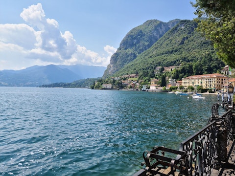 Stroll Mandello del Lario's scenic waterfront framed by Alpine peaks