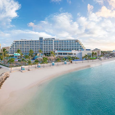 Hit the beach just metres away from your suite