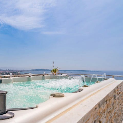 Admire stunning Cap D'Antibes views from the hot tub