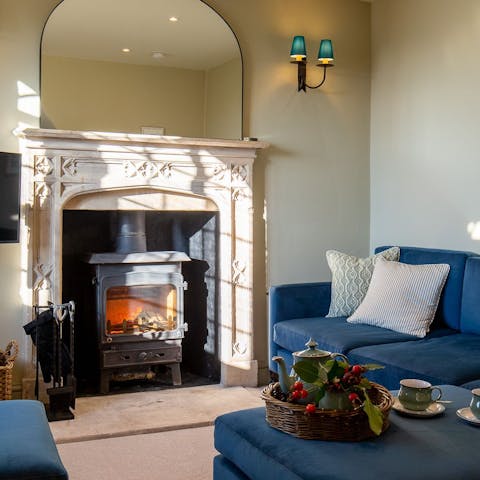 Feel the warmth with the cosy living room wood burner