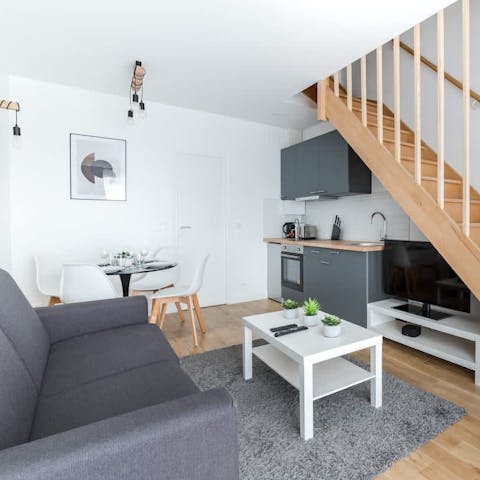 Unwind in the snug living space after sightseeing