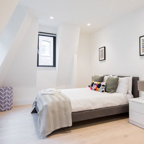 Sun-filled, high ceilinged master bedroom
