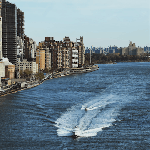 Look out on the East River from Carl Shurz park, just five minutes away
