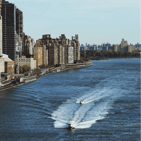 Look out on the East River from Carl Shurz park, just five minutes away
