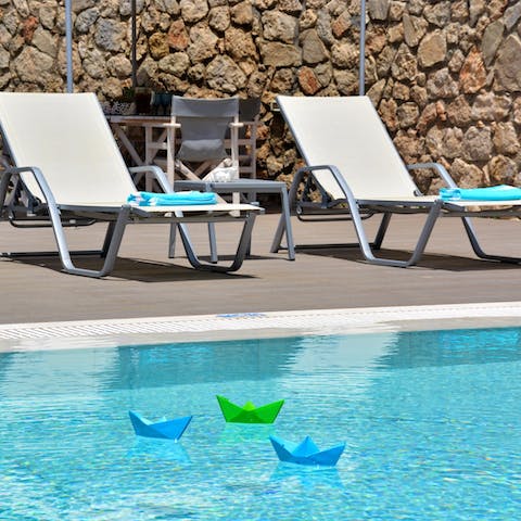Float in the private pool to cool off and dry naturally on a lounger