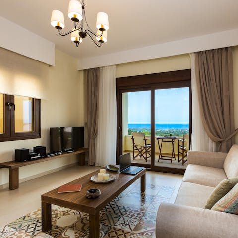 Step out to the balcony from the ornate tiles of the living room