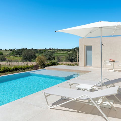 Laze the day away in the sun-drenched garden, flitting between the infinity pool and the lounge chairs