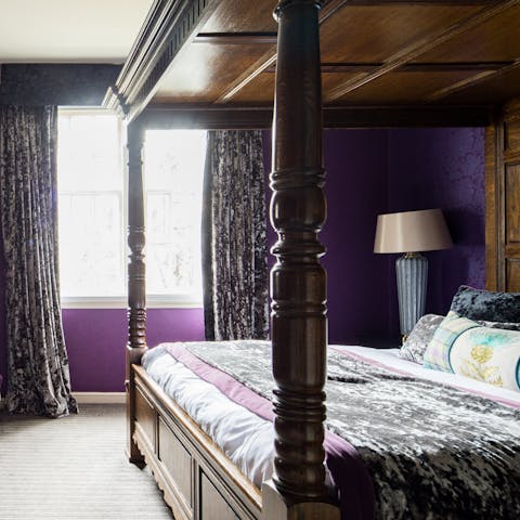 Sleep like royalty on the antique four-poster bed