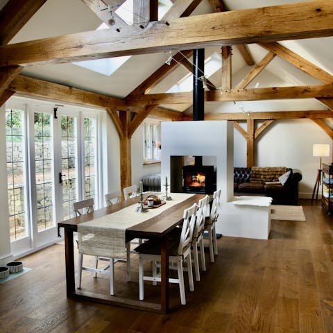 Gather together for an atmospheric meal by the fire