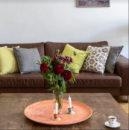 Stretch out on the comfortable sofa in the living room after a long day of exploring the city