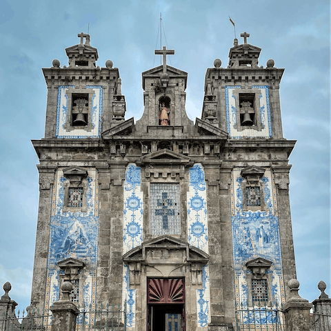 Admire the blue-tiled Igreja de Santo Ildefonso, just a three-minute walk away