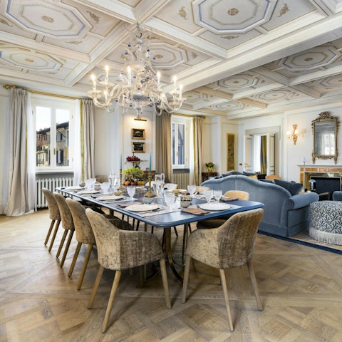 Dine under the coffered ceiling in the living space