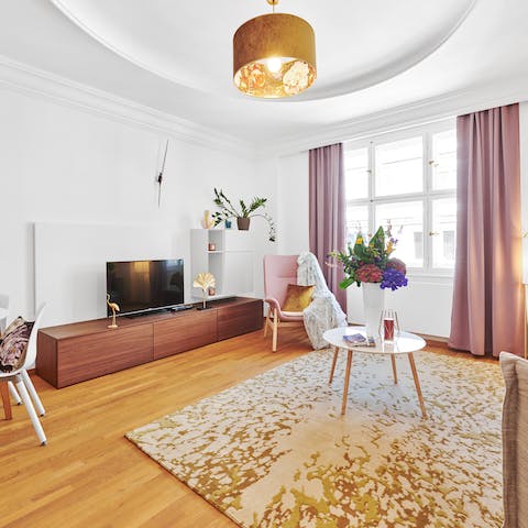 Catch up on your favourite shows in the stylish living room